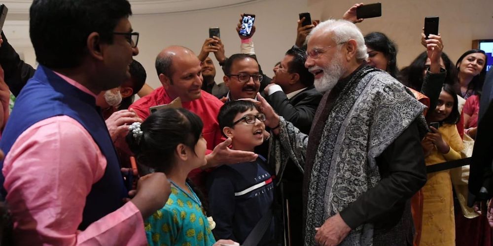 pm-modi-being-greeted-by-members-of-the-indian-diaspora-in-berlin-226395-F7QM9zbZ